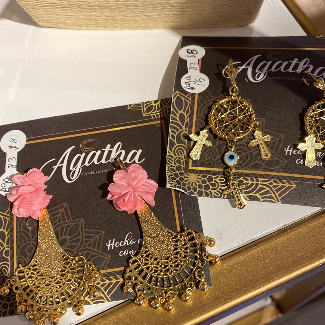 Aretes covergold ojitos (3), sombrilla (2) cruz (2)