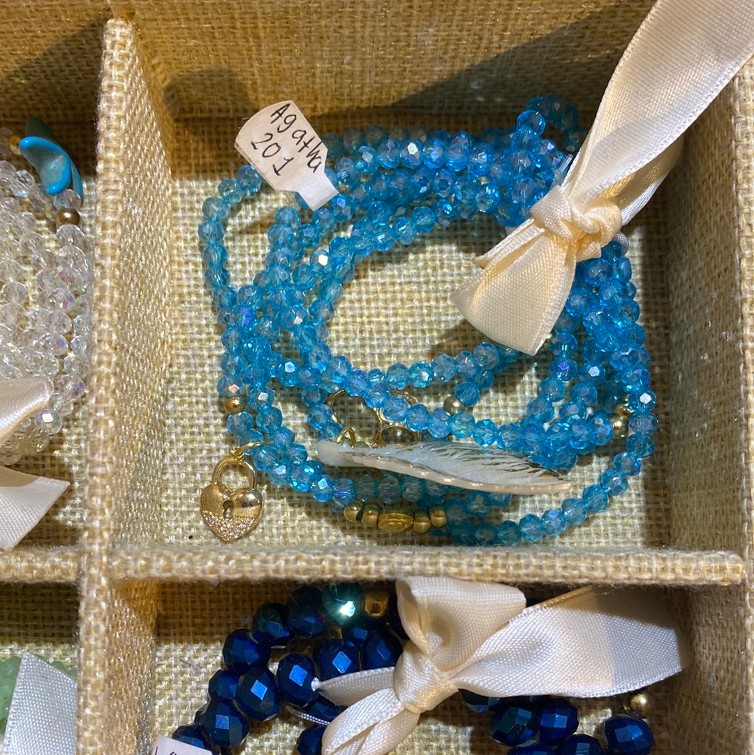 Set pulseras cristal + dije