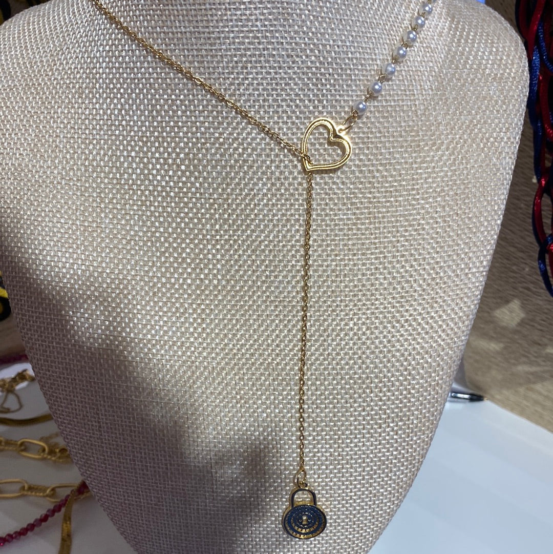 331 Cadena de rodio mediana dije candado cara de leopardo de circones y ojos verdes