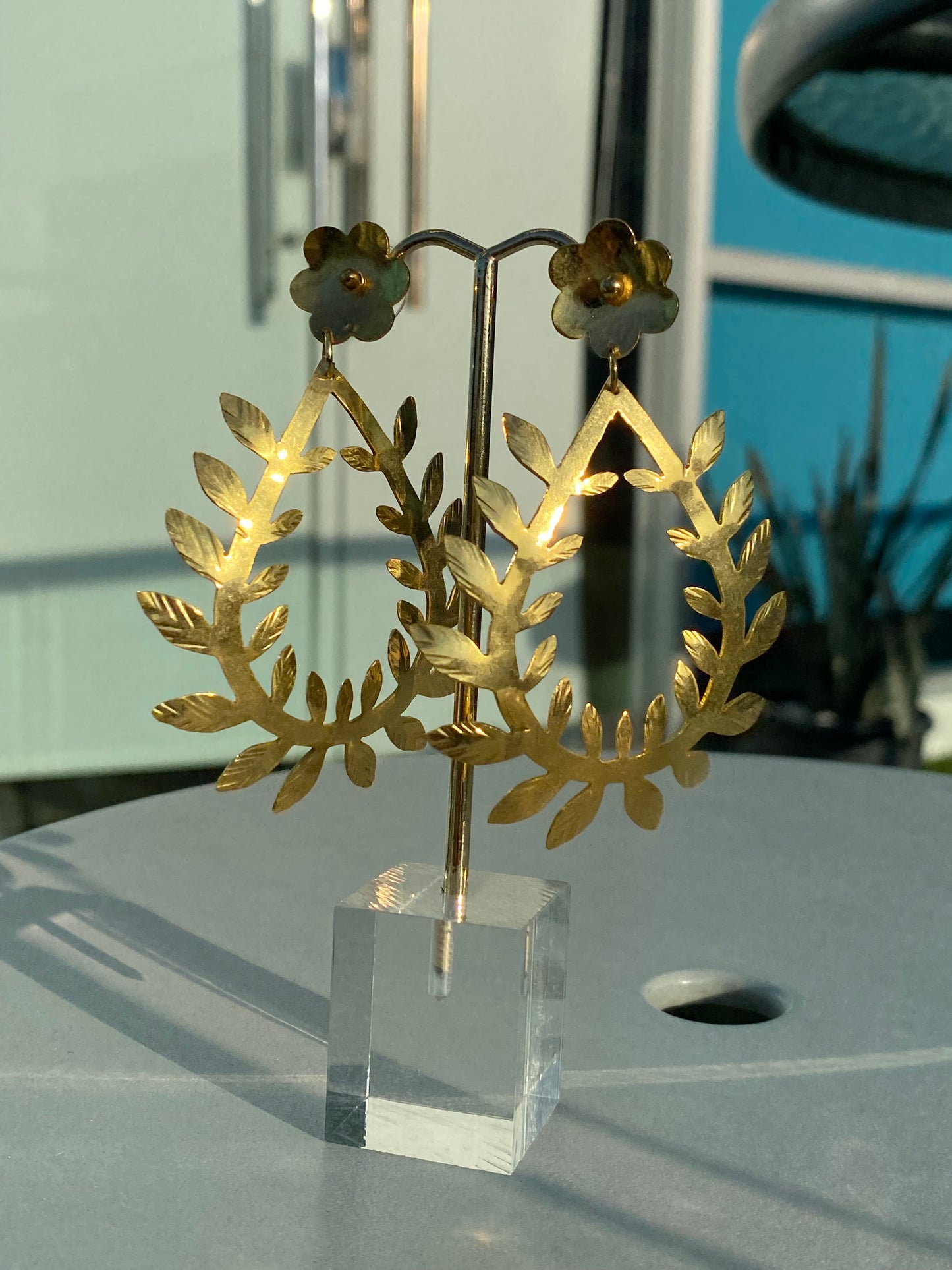 435 Aretes orfebrería flor con espiral