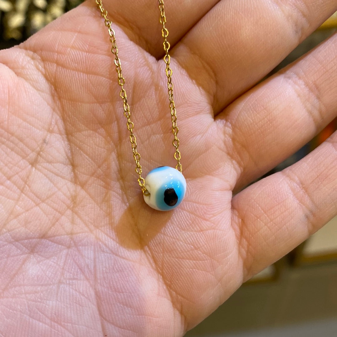 454 Cadenita simple con dije de balín ojo turco