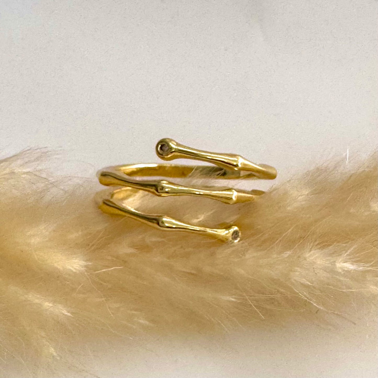 Anillo Esqueleto Triple Vuelta de Rodio