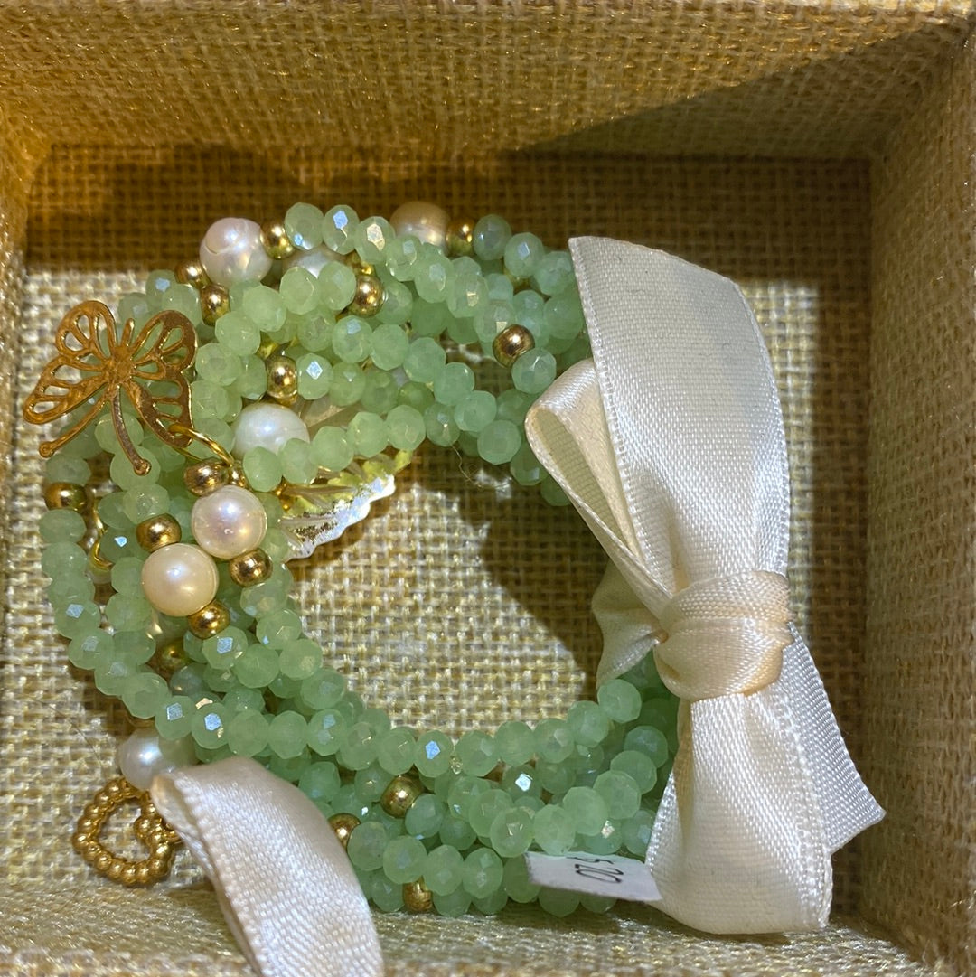 545 Set de pulseras piedras + dijes