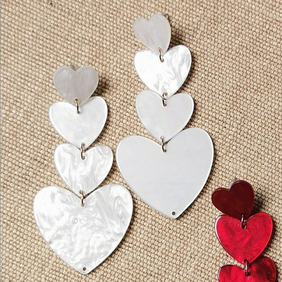 33 Aretes corazones carey