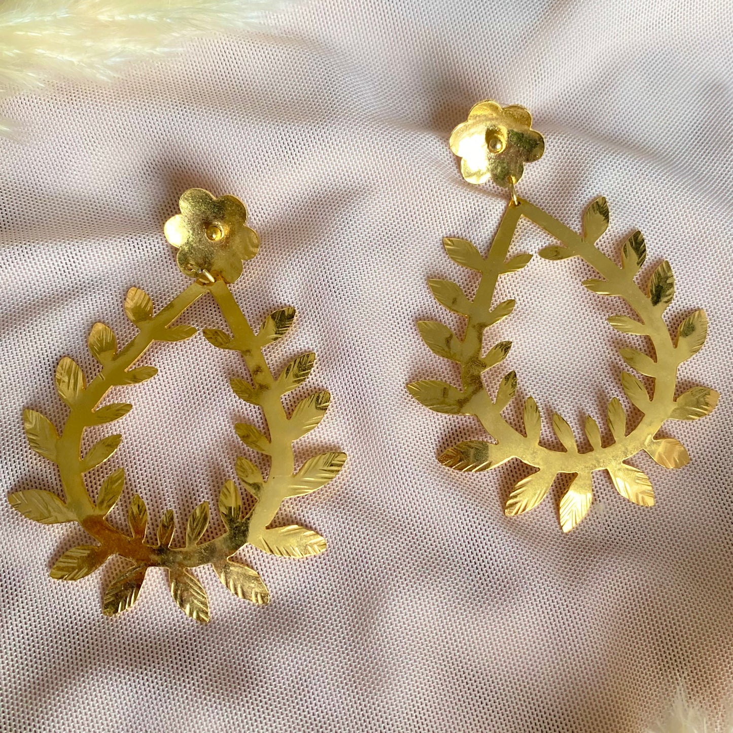 435 Aretes orfebrería flor con espiral