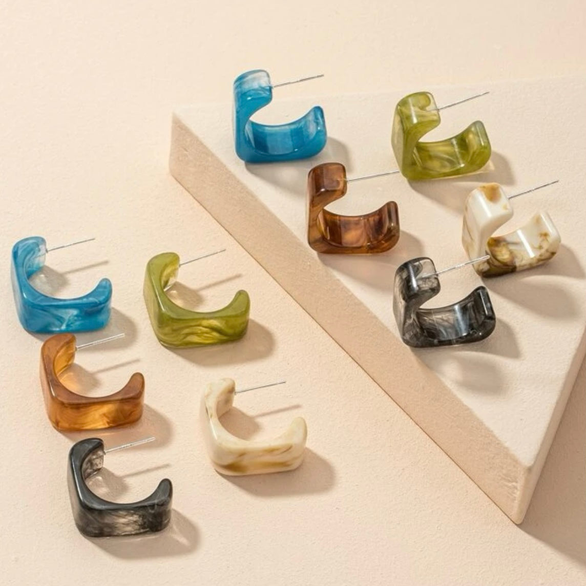 374 Argollas pequeñas cuadradas acrilicas