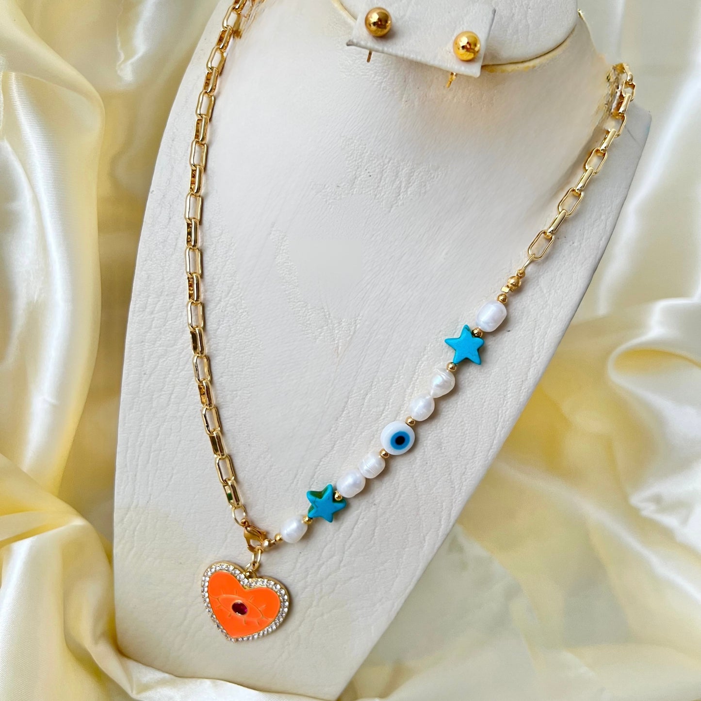 454 Collar con dije grande Corazon anaranjado y Perla/turquesas/varios